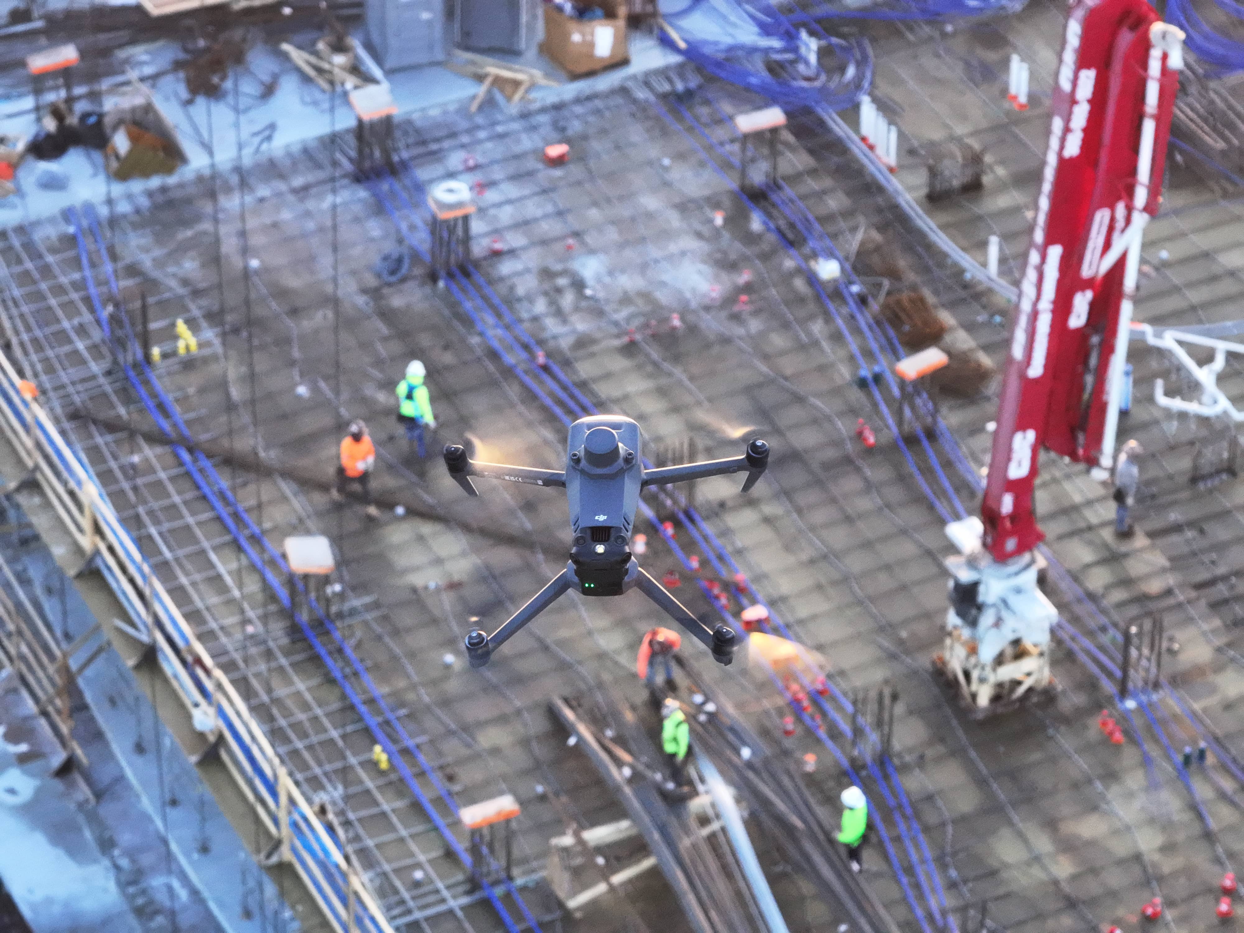 drone flying over site